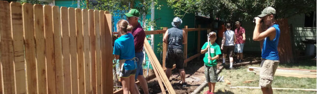 The youth group helping repair a fence in Fort Collins, Colorado